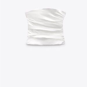 Never worn corset tube top. Wrinkles will come out with a steamer!